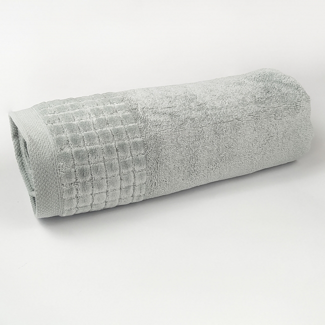 Ręcznik bawełna egipska LARISA 70x140 szary zwinięty